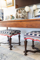 Kitchen footstools upholstered in Lost and Found Indigo, accented with playful Hot Pink Big Top Tape trim. A charming touch of fun and character in the design, expertly styled by Collins Design Co. Photography by Morgan Duke.